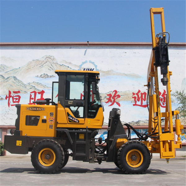 Hydraulic post installation highway guardrail pile driver